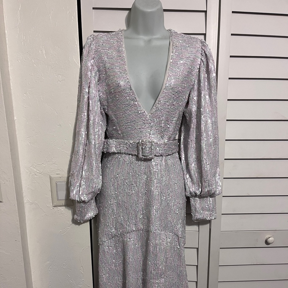 Iona Elegant Silver Sequin Dress with deep plunge neckline and side split.